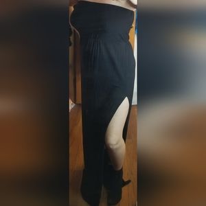 New. Black strapless dress with leg slit.